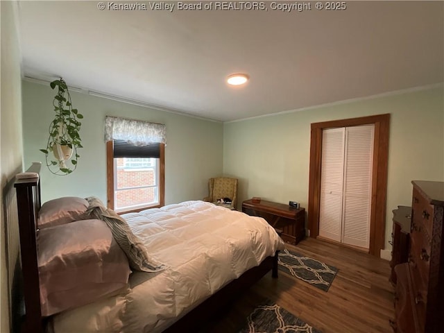 2169 N 21st St, Nitro, WV 25143 - bedroom featuring crown molding, wood finished floors, a closet, and baseboards