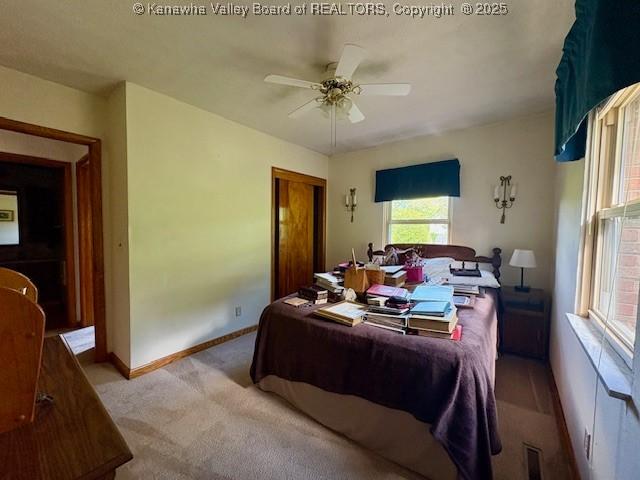 2011 Archibald Dr, Charleston, WV 25320 - bedroom featuring carpet, baseboards, a closet, and a ceiling fan