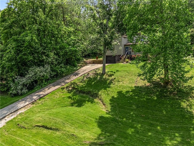 26 Banister Dr, Cross Lanes, WV 25313 - view of green lawn featuring driveway
