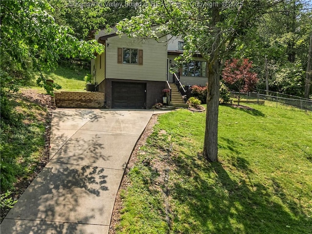 26 Banister Dr, Cross Lanes, WV 25313 - view of front of home featuring stairs, concrete driveway, and an attached garage