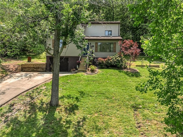 26 Banister Dr, Cross Lanes, WV 25313 - view of front of house featuring stairway, driveway, a garage, and a front lawn