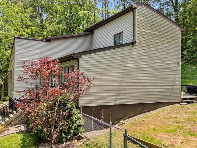 26 Banister Dr, Cross Lanes, WV 25313 - view of property exterior featuring stairs