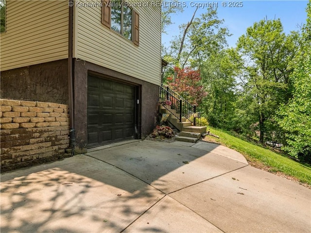 26 Banister Dr, Cross Lanes, WV 25313 - garage with driveway