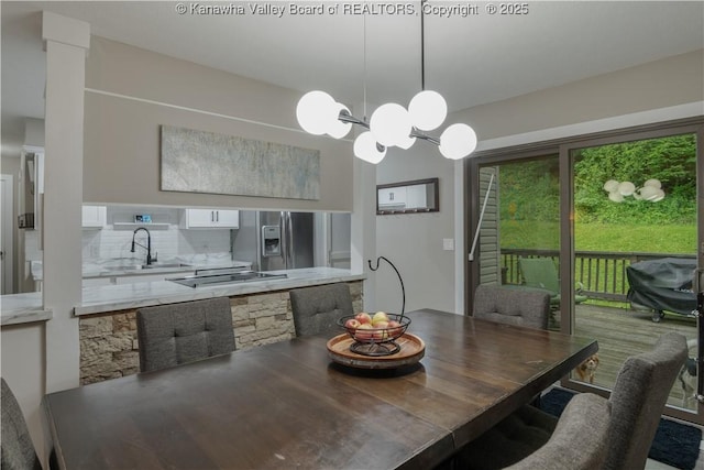 26 Banister Dr, Cross Lanes, WV 25313 - dining room with a chandelier