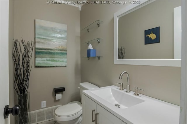 26 Banister Dr, Cross Lanes, WV 25313 - bathroom featuring vanity, toilet, tile patterned flooring, and baseboards