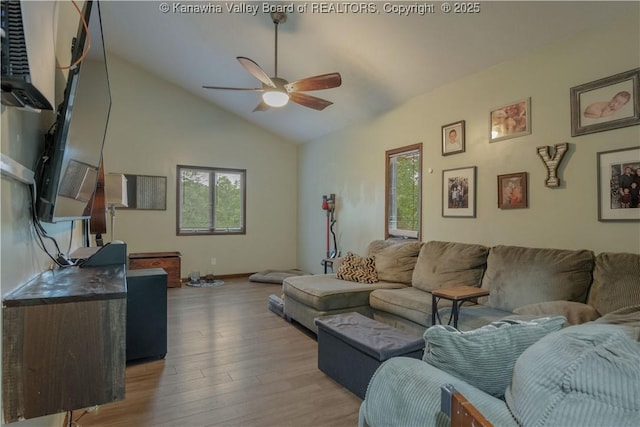 26 Banister Dr, Cross Lanes, WV 25313 - living area with a ceiling fan, plenty of natural light, light wood-style flooring, vaulted ceiling, and baseboards
