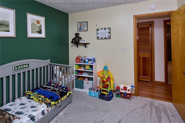 205 Autumn Dr, Dunbar, WV 25064 - bedroom with carpet, a textured ceiling, and baseboards