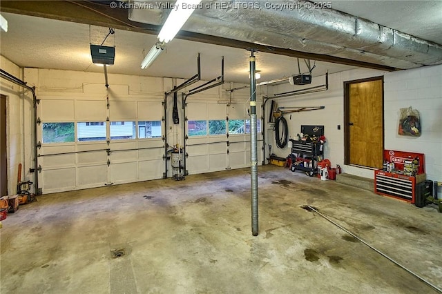 205 Autumn Dr, Dunbar, WV 25064 - garage with a garage door opener