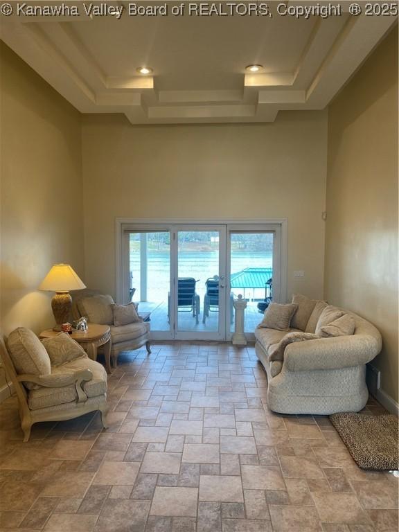 11 Larabee Ln, Winfield, WV 25213 - living room with a high ceiling, stone tile flooring, and recessed lighting