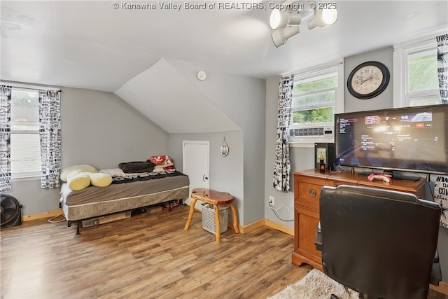 223 Easter Rd, Nitro, WV 25143 - bedroom featuring light wood finished floors, baseboards, and lofted ceiling