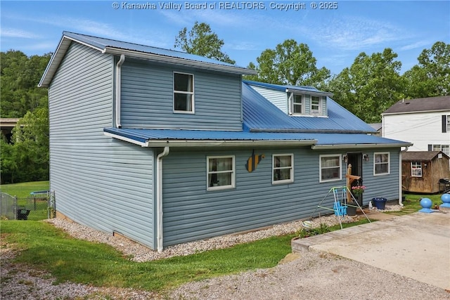 223 Easter Rd, Nitro, WV 25143 - view of front of home featuring a patio and metal roof