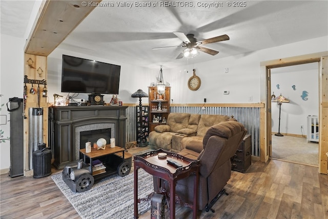 223 Easter Rd, Nitro, WV 25143 - living area featuring wood finished floors, a ceiling fan, baseboards, and beverage cooler