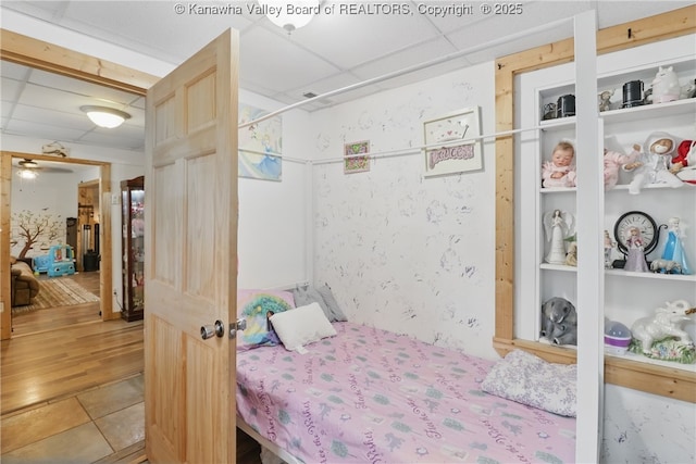 223 Easter Rd, Nitro, WV 25143 - bedroom featuring a drop ceiling and wood finished floors