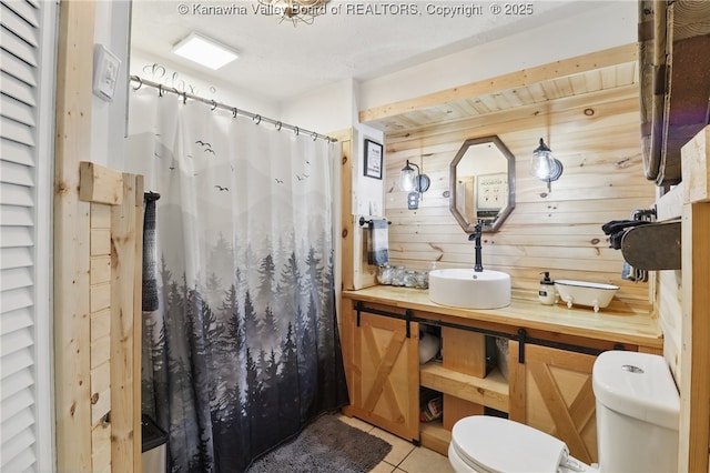223 Easter Rd, Nitro, WV 25143 - full bathroom with toilet, tile patterned flooring, a shower with curtain, and vanity