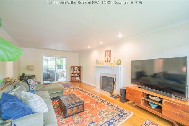 1418 Sweetbrier Rd, Charleston, WV 25314 - living area with wood finished floors, ornamental molding, a fireplace with flush hearth, and recessed lighting