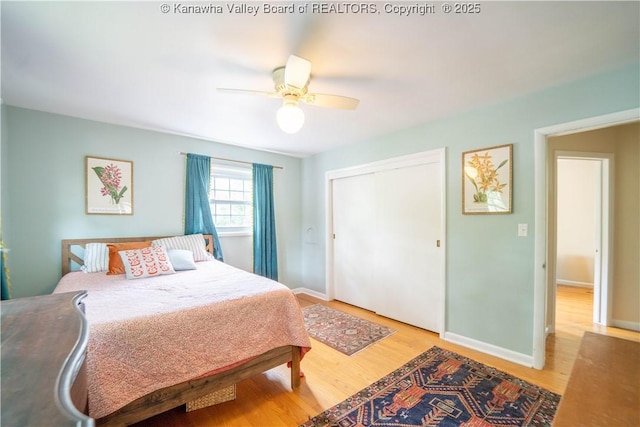 1418 Sweetbrier Rd, Charleston, WV 25314 - bedroom featuring light wood-type flooring, a closet, baseboards, and a ceiling fan