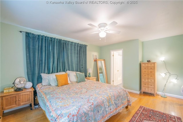 1418 Sweetbrier Rd, Charleston, WV 25314 - bedroom with light wood-style floors, baseboards, ceiling fan, and ensuite bath