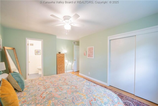 1418 Sweetbrier Rd, Charleston, WV 25314 - bedroom with a closet, ensuite bathroom, a ceiling fan, and baseboards