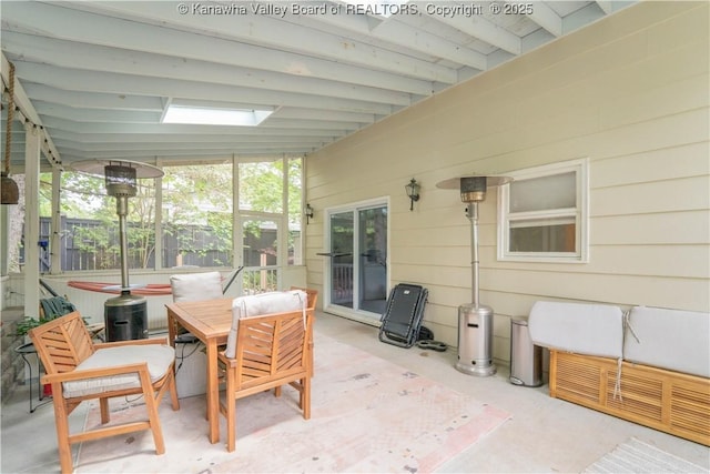 1418 Sweetbrier Rd, Charleston, WV 25314 - sunroom / solarium featuring a jacuzzi, outdoor dining space, and vaulted ceiling