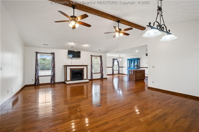 213 Rumer Sta, Red House, WV 25168 - unfurnished living room featuring a ceiling fan, beam ceiling, wood finished floors, high vaulted ceiling, and a fireplace with raised hearth
