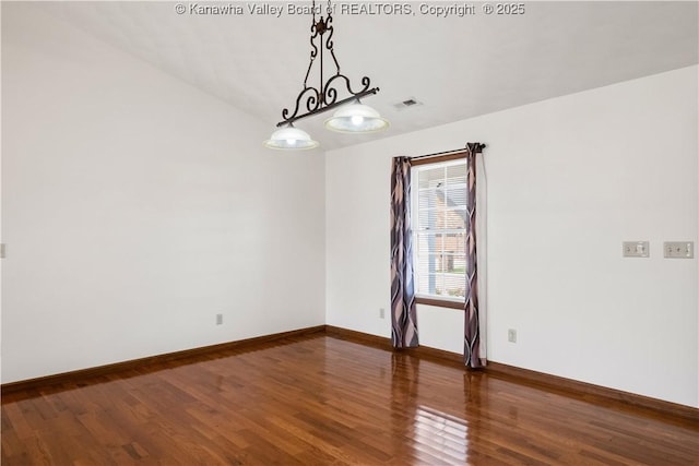 213 Rumer Sta, Red House, WV 25168 - unfurnished room with wood finished floors, baseboards, and vaulted ceiling