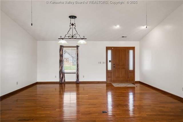 213 Rumer Sta, Red House, WV 25168 - foyer with wood finished floors, lofted ceiling, and baseboards