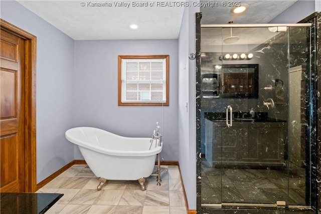 213 Rumer Sta, Red House, WV 25168 - bathroom featuring baseboards, a freestanding tub, a shower stall, and recessed lighting