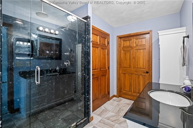 213 Rumer Sta, Red House, WV 25168 - bathroom featuring marble finish floors, a shower stall, and vanity