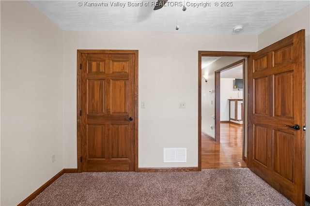 213 Rumer Sta, Red House, WV 25168 - spare room featuring baseboards, carpet floors, ceiling fan, and a smoke detector