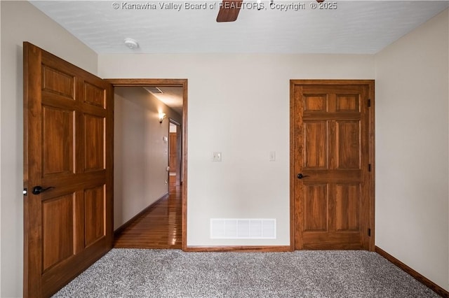 213 Rumer Sta, Red House, WV 25168 - unfurnished bedroom featuring carpet floors, baseboards, and ceiling fan