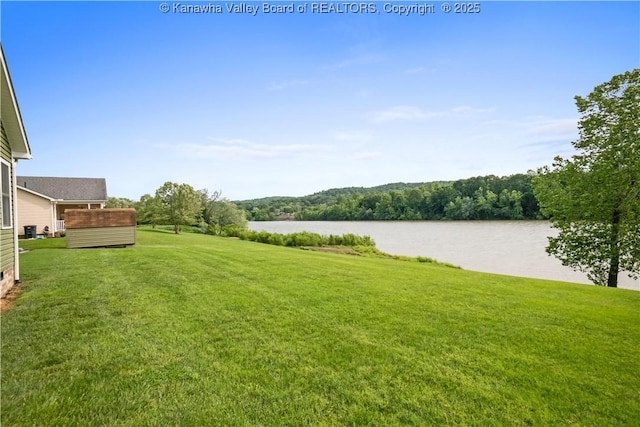 213 Rumer Sta, Red House, WV 25168 - view of green lawn featuring a water view