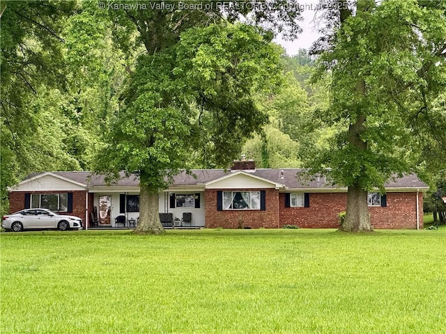 1070 Teays Ln, Hurricane, WV 25526 - ranch-style house with a front lawn and brick siding