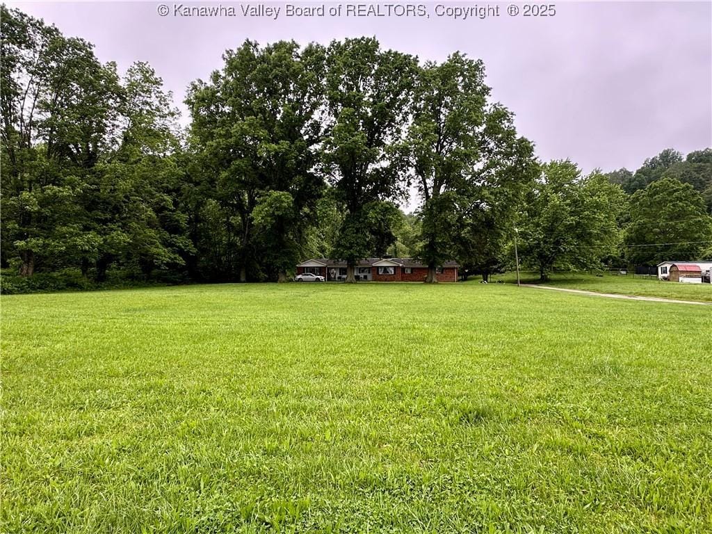 1070 Teays Ln, Hurricane, WV 25526 - view of grassy yard with a wooded view