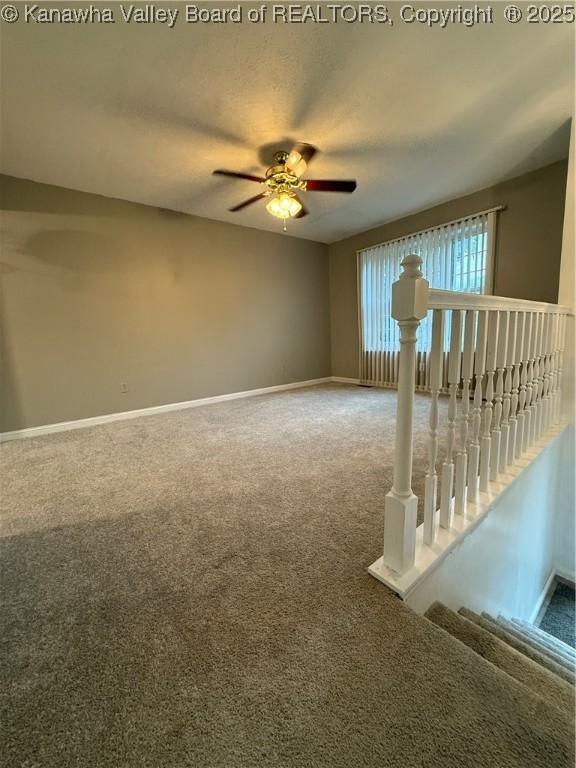 211 Geronimo Dr, Saint Albans, WV 25177 - carpeted empty room with a ceiling fan and baseboards