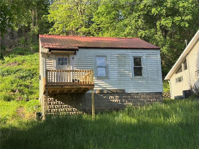 3211 Georges Dr, Saint Albans, WV 25177 - back of property with metal roof and a wooden deck