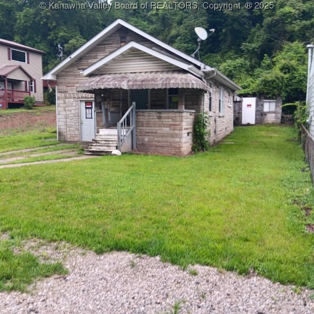 816 Hannah Dr, Charleston, WV 25387 - view of front facade featuring a front yard, a porch, and stone siding
