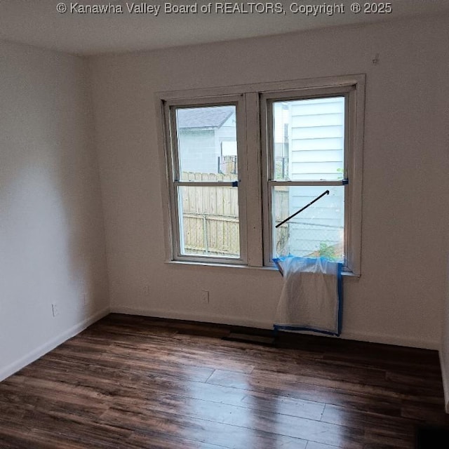 816 Hannah Dr, Charleston, WV 25387 - unfurnished room with dark wood-type flooring and baseboards
