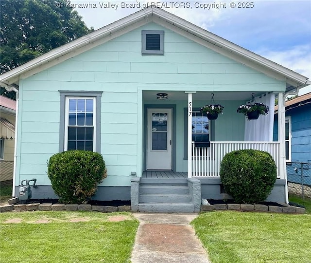 517 16th St, Dunbar, WV 25064 - bungalow with a porch and a front yard