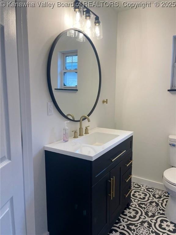 517 16th St, Dunbar, WV 25064 - half bathroom featuring toilet, vanity, baseboards, and tile patterned flooring