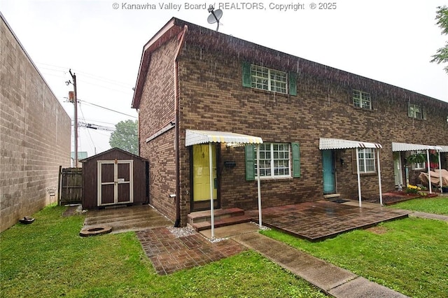 121 1st Ave, South Charleston, WV 25303 - rear view of house featuring brick siding and entry steps