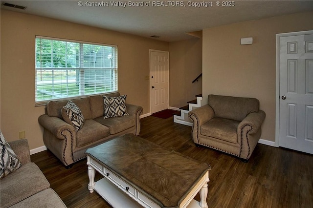 121 1st Ave, South Charleston, WV 25303 - living room featuring stairs, wood finished floors, and baseboards