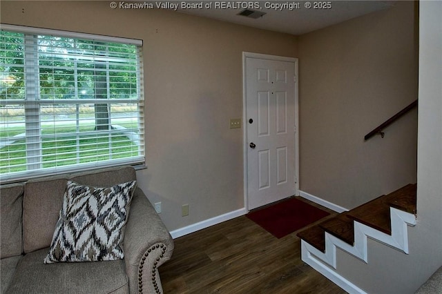 121 1st Ave, South Charleston, WV 25303 - entryway featuring dark wood-type flooring, baseboards, and stairs