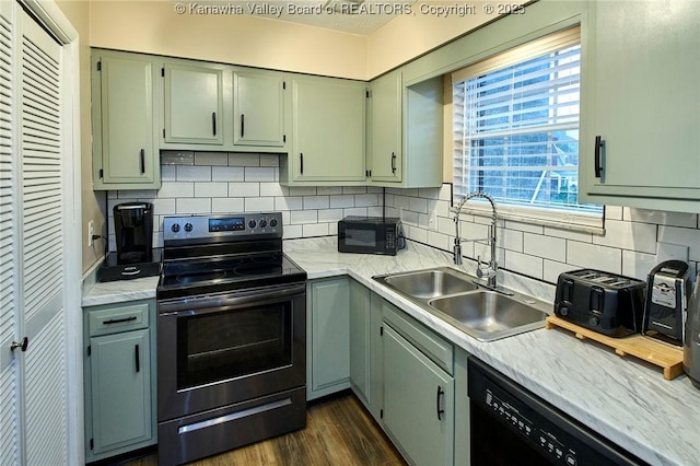 121 1st Ave, South Charleston, WV 25303 - kitchen with black appliances, a sink, light countertops, and backsplash