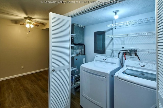 121 1st Ave, South Charleston, WV 25303 - washroom featuring electric panel, a ceiling fan, separate washer and dryer, dark wood finished floors, and baseboards