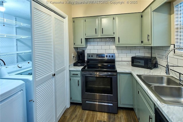 121 1st Ave, South Charleston, WV 25303 - kitchen featuring range with electric stovetop, black microwave, dark wood-style floors, light countertops, and tasteful backsplash