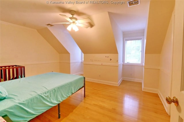 5 Stony Point Rd, Charleston, WV 25314 - bedroom with wood finished floors, baseboards, vaulted ceiling, and a ceiling fan