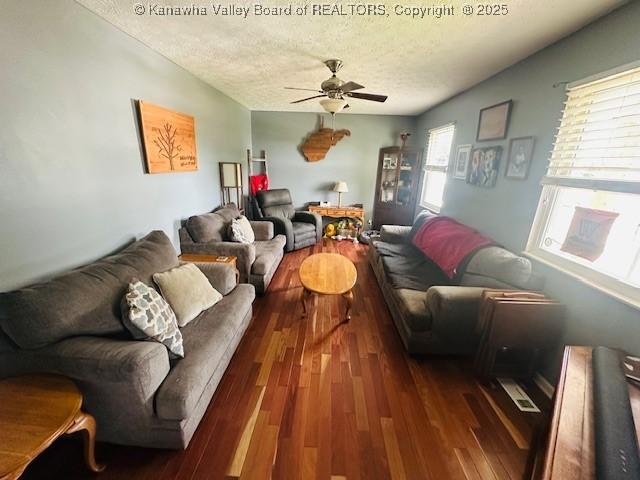 136 Timberlake Cir, Scott Depot, WV 25560 - living area with ceiling fan, a textured ceiling, and wood finished floors