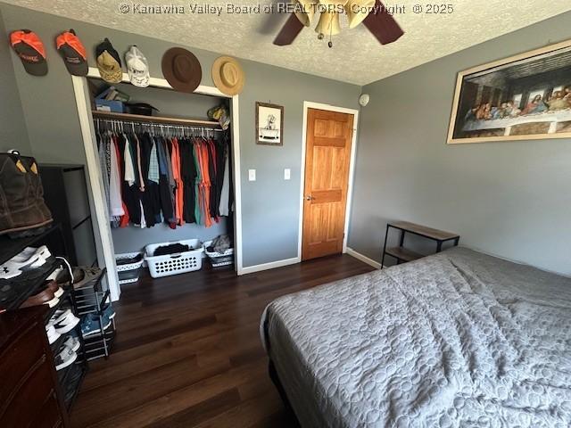 136 Timberlake Cir, Scott Depot, WV 25560 - bedroom with wood finished floors, a textured ceiling, a closet, and a ceiling fan