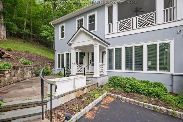 1931 Village Run Rd, White Sulphur Springs, WV 24986 - view of front facade with stucco siding and covered porch