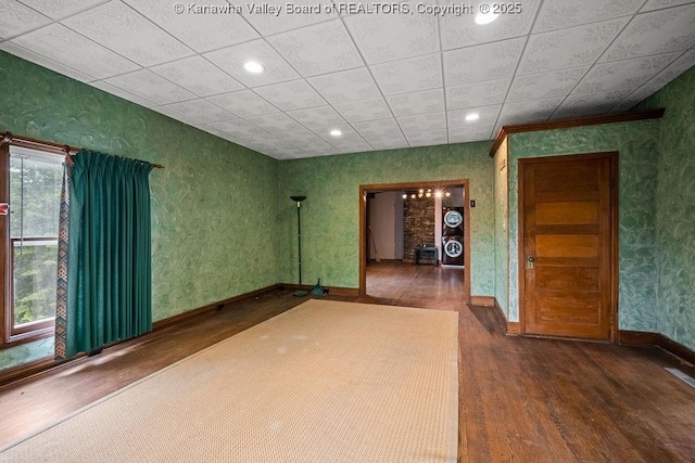 1931 Village Run Rd, White Sulphur Springs, WV 24986 - empty room featuring wood finished floors, wallpapered walls, recessed lighting, and baseboards